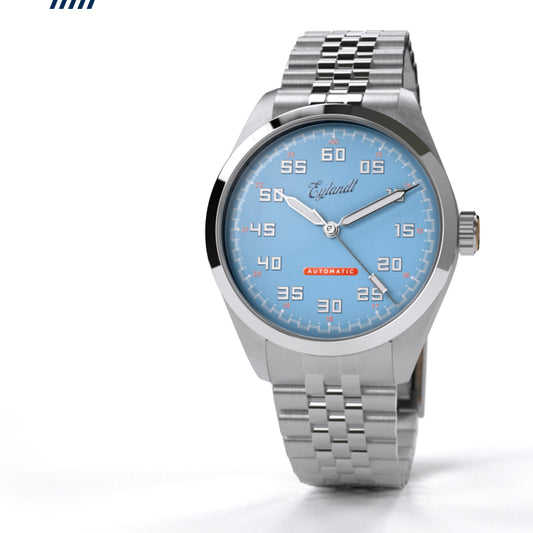 Eylandt Nitro automatic watch with light blue dial, brushed stainless steel case, polished bezel, and stainless steel bracelet.